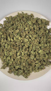 PUFFY High Octane (smalls) is a balanced hybrid THCa strain bred from a distinguished lineage of Sunset Sherbet and Octane. The aroma is driven by pungent diesel and skunky notes, delivering a bold, fuel-forward finish. Visually, dense forest green buds with purple hues and fiery orange pistils are coated in sticky trichomes. Consumers often report feeling euphoric and deeply relaxed, while also experiencing a boost in creativity, focus, and appetite. 
