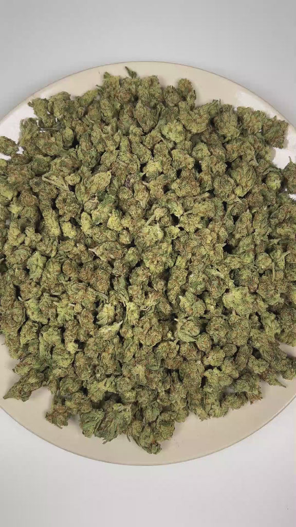 PUFFY High Octane (smalls) is a balanced hybrid THCa strain bred from a distinguished lineage of Sunset Sherbet and Octane. The aroma is driven by pungent diesel and skunky notes, delivering a bold, fuel-forward finish. Visually, dense forest green buds with purple hues and fiery orange pistils are coated in sticky trichomes. Consumers often report feeling euphoric and deeply relaxed, while also experiencing a boost in creativity, focus, and appetite. 