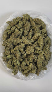 PUFFY Tangie is a sativa-dominant hybrid THCa strain born from the flavorful lineage of California Orange (Cali-O) and Skunk #1. The aroma is a funky fusion of ripe strawberries, tangy blue cheese, and bright oranges, a profile that's boldly mirrored in its flavor. Visually, the buds are dense and frosty, with thick, silvery-white trichomes that give the colas a shimmering, snow-covered appearance. Consumers often describe the effects as energizing and euphoric, delivering a clear-headed, cerebral high that
