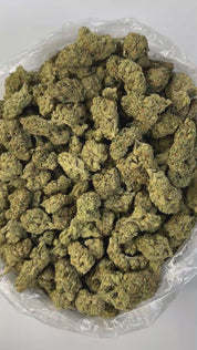 PUFFY Lemon Kush is a well-balanced hybrid THCa strain resulting from a cross between Master Kush and Lemon Joy. It boasts a bold and invigorating lemon aroma layered with earthy and herbal undertones. The flavor profile mirrors its scent sweet and tangy lemon notes accented by subtle hints of spice and earthiness. Visually, the buds are light green with yellow highlights, generously coated in frosty trichomes and accented by vibrant orange pistils. Consumers often report an uplifted mood and a sense of eup
